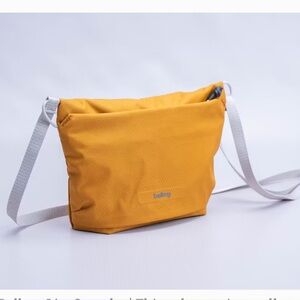 Bellroy Compact Crossbody Bag in Mustard Yellow with White Strap